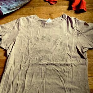 Sitting from grey shirt